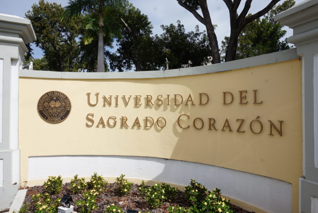 Universidad Del Sagrado Corazon sign outside of the campus