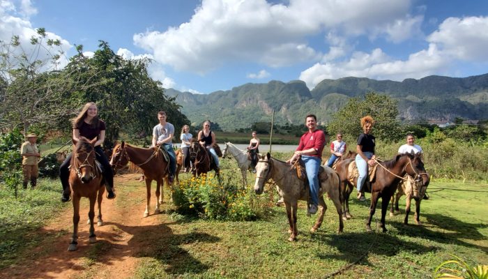 Students enjoy horseback riding through Cuba in their freetime