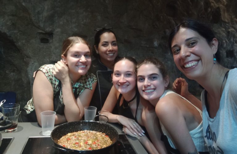 Students enjoy food they cooked at a cooking class in Alicante