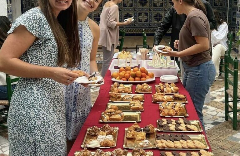 Students enjoying pastries and oranges After classes.