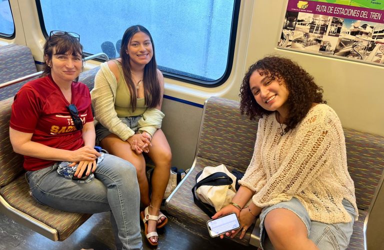 Students take photo on a train in san juan