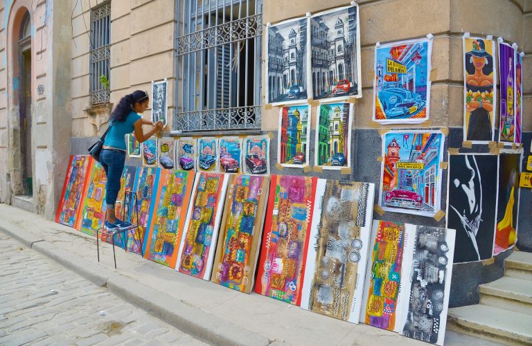 Local artist in Havana setting up her art work