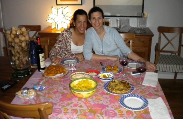 spanish host family enjoying dinner